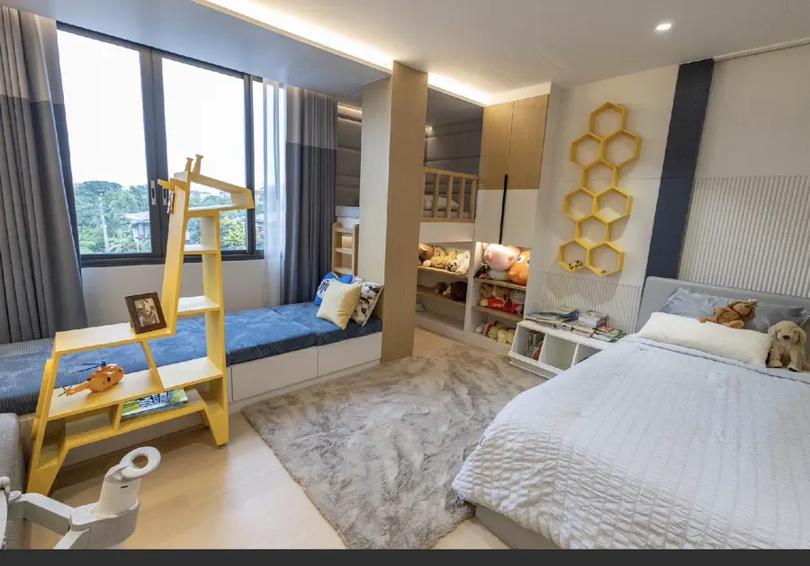 Bright family bedroom with custom built-ins